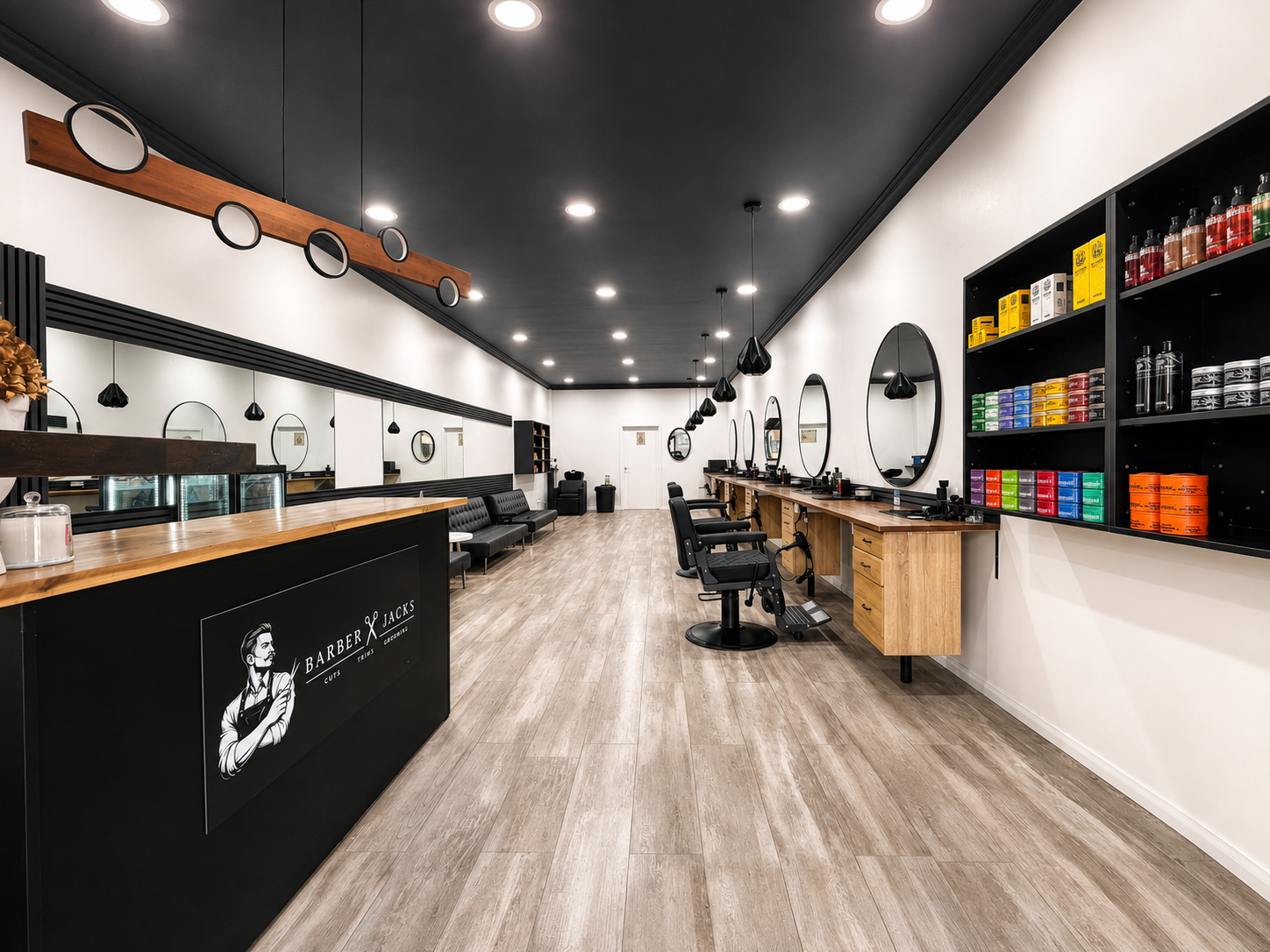 Barber Jacks shop interior, Gunnedah — barber chairs, round mirrors and product shelves