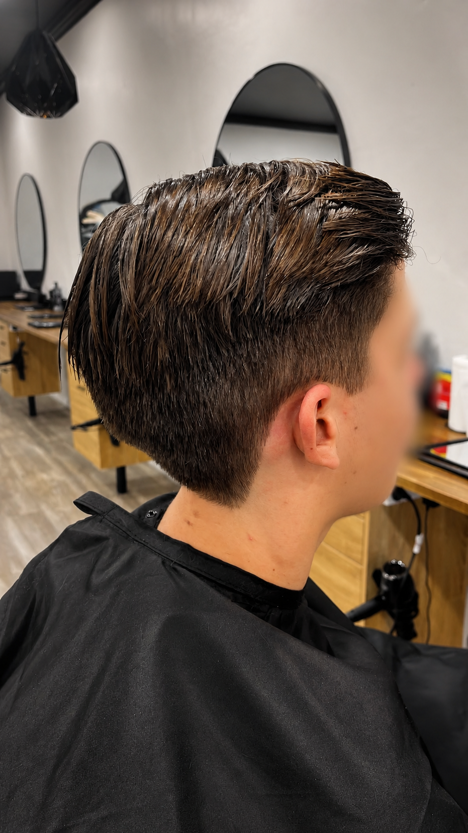 Completed men's haircut styled with product at Barber Jacks, Gunnedah